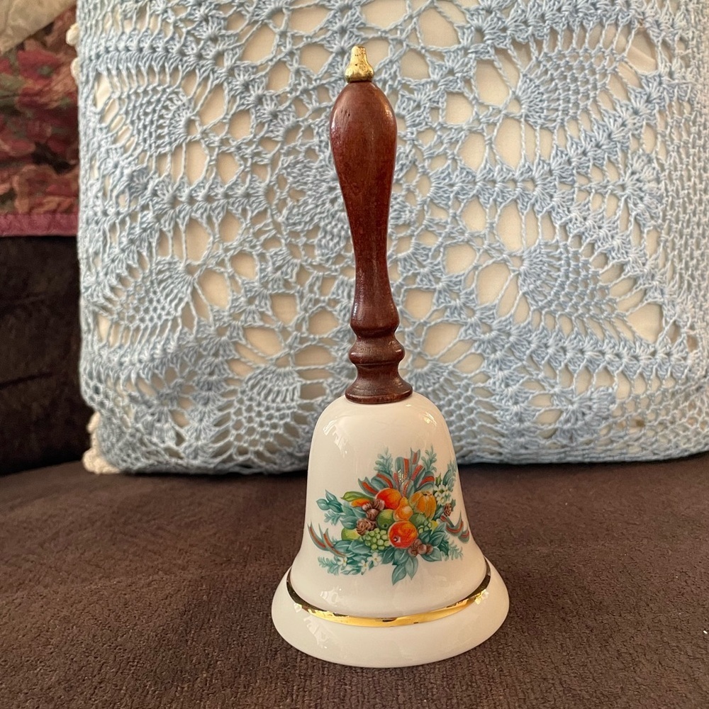 Avon Brand "Christmas 1985" Ceramic Bell with Wooden Handle w/gold tip vintage